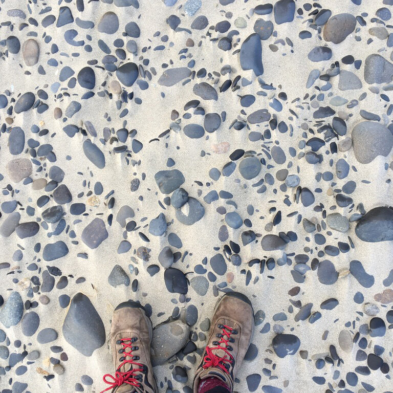 Kara feet on the beach
